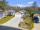 House with a driveway and landscaped yard, viewed from above at 132 Meadow Blvd, Sanford, FL 32771