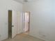 Bedroom with doors to bathroom and closet at 3514 Victoria Pines Dr # 148, Orlando, FL 32829