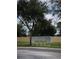 Community mailboxes with a tree and grassy area at 3514 Victoria Pines Dr # 148, Orlando, FL 32829