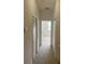 Hallway with linen closet and access to bedrooms at 3514 Victoria Pines Dr # 148, Orlando, FL 32829