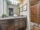 Bathroom with double vanity and shower at 8887 Qin Loop, Kissimmee, FL 34747