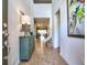 Bright and spacious entryway with a teal cabinet at 8887 Qin Loop, Kissimmee, FL 34747