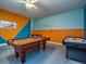 Game room with pool table and air hockey at 8887 Qin Loop, Kissimmee, FL 34747
