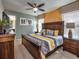Relaxing bedroom with a king-size bed and ensuite bathroom at 8887 Qin Loop, Kissimmee, FL 34747
