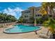 Inviting community swimming pool with lounge chairs at 311 E Morse Blvd # 7-2, Winter Park, FL 32789