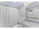 Clean bathroom, featuring a marble vanity and shower at 311 E Morse Blvd # 7-2, Winter Park, FL 32789