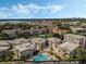 Aerial view of community pool and multiple condo buildings at 311 E Morse Blvd # 7-2, Winter Park, FL 32789