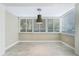 Sunlit dining area with tile flooring and window blinds at 311 E Morse Blvd # 7-2, Winter Park, FL 32789