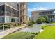 Landscaped grounds with a serene water feature at 311 E Morse Blvd # 7-2, Winter Park, FL 32789