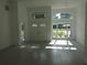 Bright and airy living room with high ceilings and hardwood floors at 531 Rhodes Dr, Deland, FL 32720