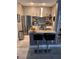 Modern kitchen with stainless steel appliances and granite countertops at 5525 Pga Blvd # 4614, Orlando, FL 32839