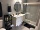 Updated bathroom with floating vanity, walk-in shower, and modern fixtures at 5525 Pga Blvd # 4614, Orlando, FL 32839