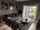 Modern living room features a comfy sofa, coffee table, and sliding glass door leading to a balcony at 5525 Pga Blvd # 4614, Orlando, FL 32839