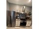 Modern kitchen with stainless steel appliances and granite countertops at 5525 Pga Blvd # 4614, Orlando, FL 32839