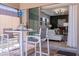Covered patio with view into the living room at 333 Navarra Ln, Davenport, FL 33837