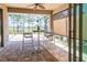 Screened patio with table and chairs, perfect for outdoor dining at 333 Navarra Ln, Davenport, FL 33837