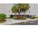 Building exterior with landscaping and parking at 6165 Carrier Dr # 1214, Orlando, FL 32819