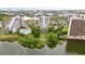 Aerial view of waterfront property and amenities at 6165 Carrier Dr # 1214, Orlando, FL 32819