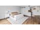 Studio condo with bedroom, barn door, and small kitchen at 6165 Carrier Dr # 1214, Orlando, FL 32819