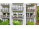 Building exterior showcasing multiple balconies at 6165 Carrier Dr # 1214, Orlando, FL 32819
