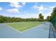 Enjoy a game of tennis on this well-maintained court at 619 Kensington Dr, Davenport, FL 33897