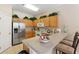 Kitchen features stainless steel appliances and breakfast bar with seating at 633 Copeland Dr, Haines City, FL 33844