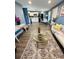 Bright living room with comfy seating, glass coffee table, and an open floor plan at 143 Bob Thomas Cir, Sanford, FL 32771
