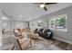 Open concept living area, hardwood floors, and modern furniture at 274 N Ranger Blvd, Winter Park, FL 32792