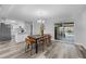 Bright dining room with a view of the pool and kitchen at 274 N Ranger Blvd, Winter Park, FL 32792