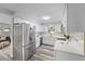 Modern kitchen with stainless steel appliances and white cabinets at 274 N Ranger Blvd, Winter Park, FL 32792