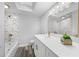 Clean bathroom with white vanity and marble shower at 274 N Ranger Blvd, Winter Park, FL 32792