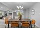 Modern dining room with a farmhouse style table and chairs at 274 N Ranger Blvd, Winter Park, FL 32792