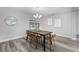 Elegant dining room with dark wood table and leather chairs at 274 N Ranger Blvd, Winter Park, FL 32792