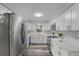 Sleek kitchen with stainless steel appliances and white shaker cabinets at 274 N Ranger Blvd, Winter Park, FL 32792
