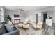 Open concept living room with a view into the kitchen at 274 N Ranger Blvd, Winter Park, FL 32792