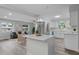 Modern kitchen boasts white cabinets, quartz countertops and stainless steel appliances at 274 N Ranger Blvd, Winter Park, FL 32792