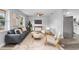 Bright living room features a comfy sofa, armchairs, and stylish coffee tables at 274 N Ranger Blvd, Winter Park, FL 32792