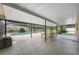 Covered patio overlooking a refreshing pool and backyard at 274 N Ranger Blvd, Winter Park, FL 32792