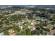 Aerial perspective of a residential area featuring houses nestled among the trees at 515 N Boyd St, Winter Garden, FL 34787