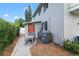 Home's exterior showcasing a side view with extra storage at 515 N Boyd St, Winter Garden, FL 34787