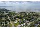 Aerial view of a lakeside community with numerous houses and lush green landscape at 515 N Boyd St, Winter Garden, FL 34787