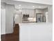 Bright kitchen with stainless steel appliances and white cabinetry at 515 N Boyd St, Winter Garden, FL 34787