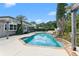 Relaxing pool and spa with surrounding landscaping at 515 N Boyd St, Winter Garden, FL 34787