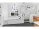 Spa-like bathroom with white subway tile, soaking tub, and glass shower at 515 N Boyd St, Winter Garden, FL 34787
