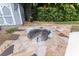 Charming fire pit area with flagstone patio at 515 N Boyd St, Winter Garden, FL 34787