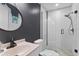 Clean bathroom with white subway tile and a walk-in shower at 515 N Boyd St, Winter Garden, FL 34787