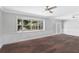 Bright dining room with hardwood floors and large bay window at 515 N Boyd St, Winter Garden, FL 34787