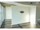 Bright living room with hardwood floors and city view at 155 S Court Ave # 2310, Orlando, FL 32801