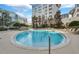 Relaxing resort-style pool with plenty of lounge chairs at 155 S Court Ave # 2310, Orlando, FL 32801