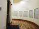 Well-lit mail room with numerous mailboxes and wood floors at 155 S Court Ave # 2310, Orlando, FL 32801